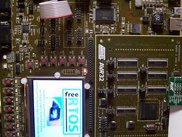LCD displaying the AVR32 and FreeRTOS.org logos