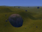 Different sized boulders resting on the terrain.