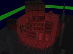 The fenced storage area, room lights off, spotlight on