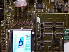 LCD displaying the AVR32 and FreeRTOS.org logos