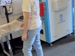 Live Client with X-ray baggage scanner with concealed weapons detection system on Apple iPad