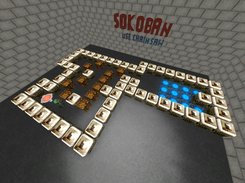sokoban ingame with player pushing boxes using chainsaw