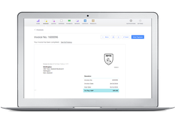 Debitoor Invoice on Laptop Screen