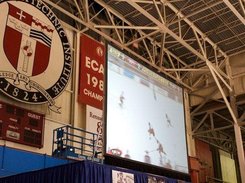 (3) Projection screen in Houston Field House showing program