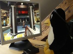 tux playing quake3