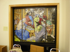 A stained-glass window taken from a side angle.