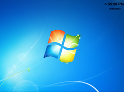Full screen with clock in the corner.