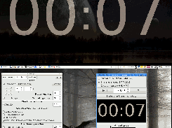 Settings and console windows on one screen, clock on another screen.